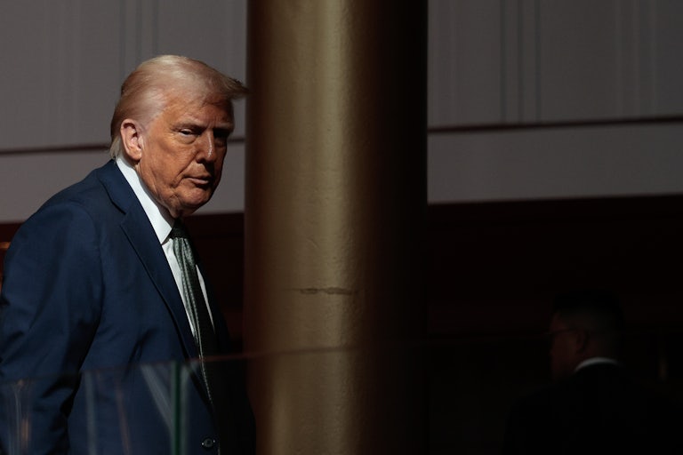 Donald Trump walks in the Kennedy Center