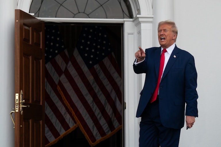Donald Trump yelling and pointing at the camera