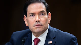 Marco Rubio stares nervously
