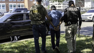 ICE agents arrest someone