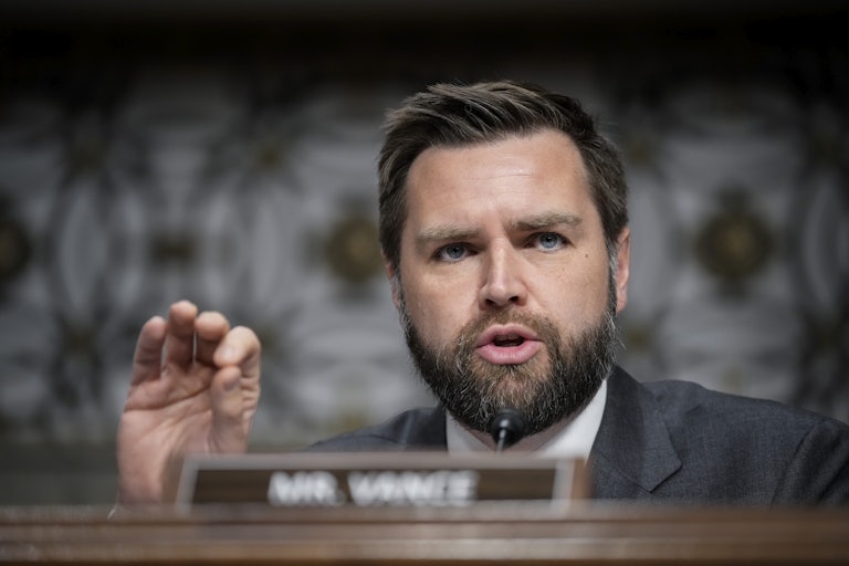 J.D. Vance gestures as he speaks
