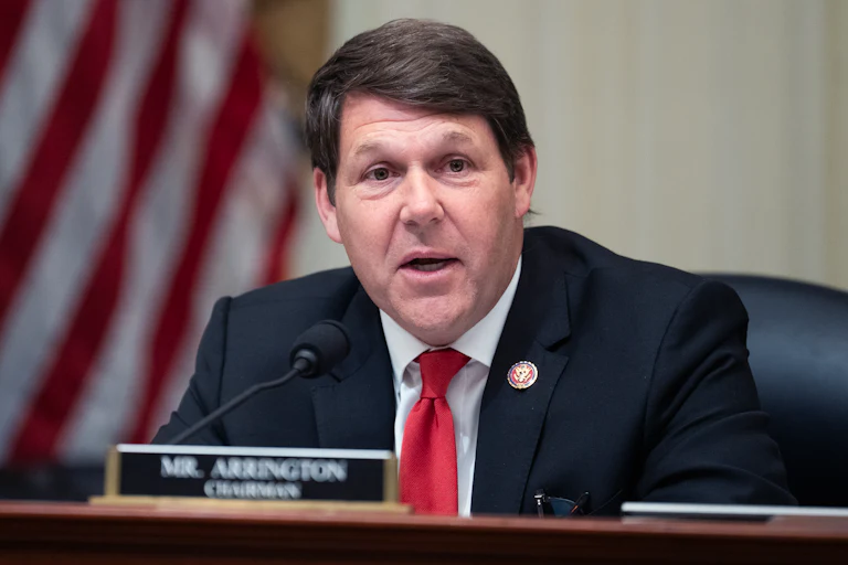 Representative Jodey Arrington speaks into a microphone during a House Budget Committee meeting
