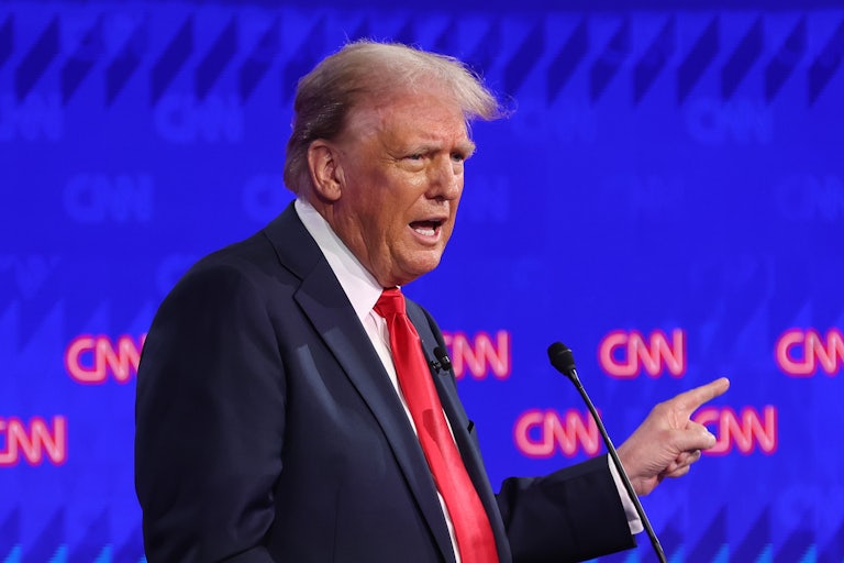 Donald Trump speaks and points at the debate