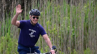 President Joe Biden riding a bike