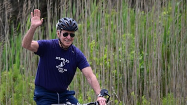 President Joe Biden riding a bike
