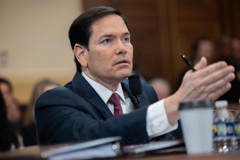 Secretary of State Marco Rubio gestures while speaking in a House hearing