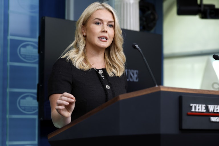White House Press Secretary Karoline Leavitt speaks at a podium.