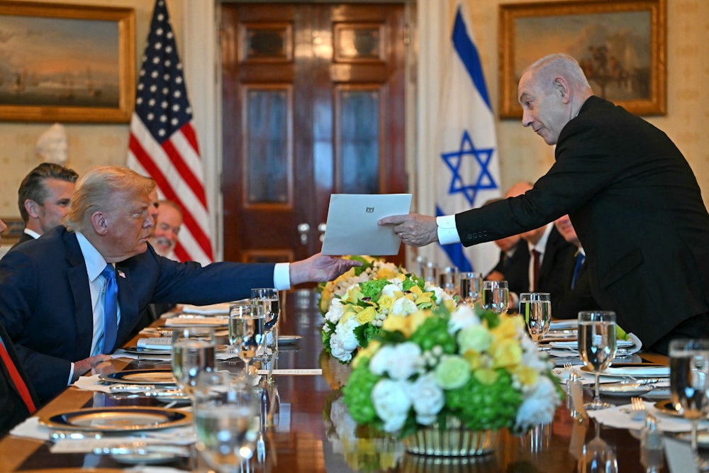 Benjamin Netanyahu handed a letter to Donald Trump during a meeting at the White House on July 7.