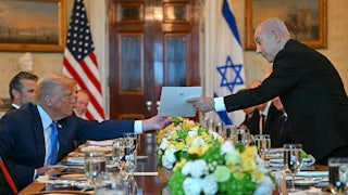 Benjamin Netanyahu handed a letter to Donald Trump during a meeting at the White House on July 7.