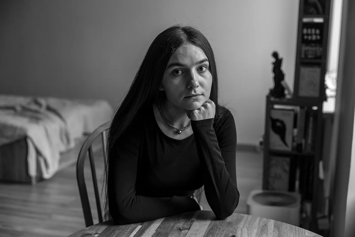 A black and white portrait of Uliana Ilnitska, also from Kyiv, works as a barista in Warsaw.