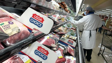 Pork and poultry products on a display shelf at a Safeway