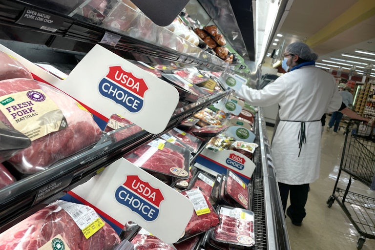Pork and poultry products on a display shelf at a Safeway