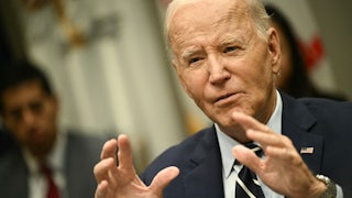 Joe Biden gesticulates while talking.