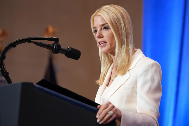 Attorney General Pam Bondi speaks at a podium