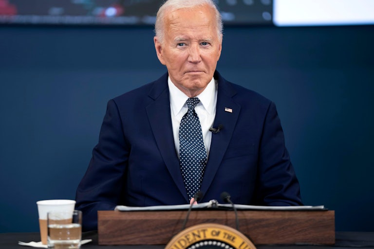 Joe Biden stands at a podium