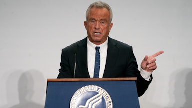 Health and Human Services Robert F. Kennedy Jr. points to the side while speaking at a podium