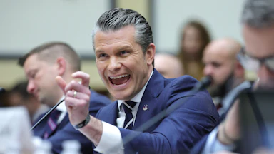 Defense Secretary Pete Hegseth gestures and speaks during a House committee hearing