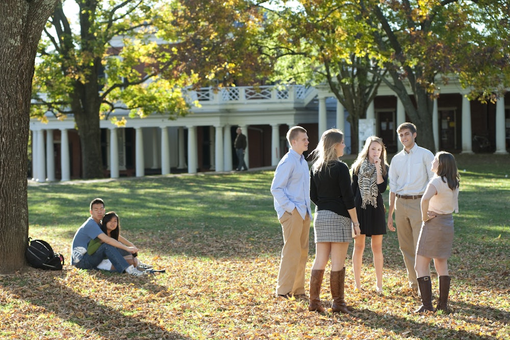 Students gather on The Lawn at the University of Virginia. The commonwealth’s flagship university only began enrolling women at its main campus in Charlottesville in 1970.