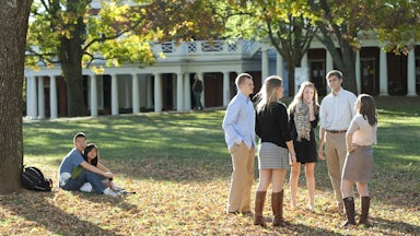Students gather on The Lawn at the University of Virginia. The commonwealth’s flagship university only began enrolling women at its main campus in Charlottesville in 1970.