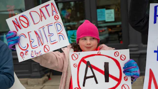 Rural Michigan residents protesting an AI data center