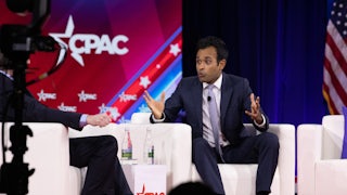 Vivek Ramaswamy speaks while seated onstage.