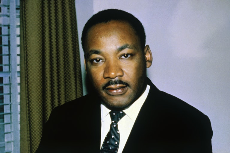 Martin Luther King, Jr. looks directly at the camera