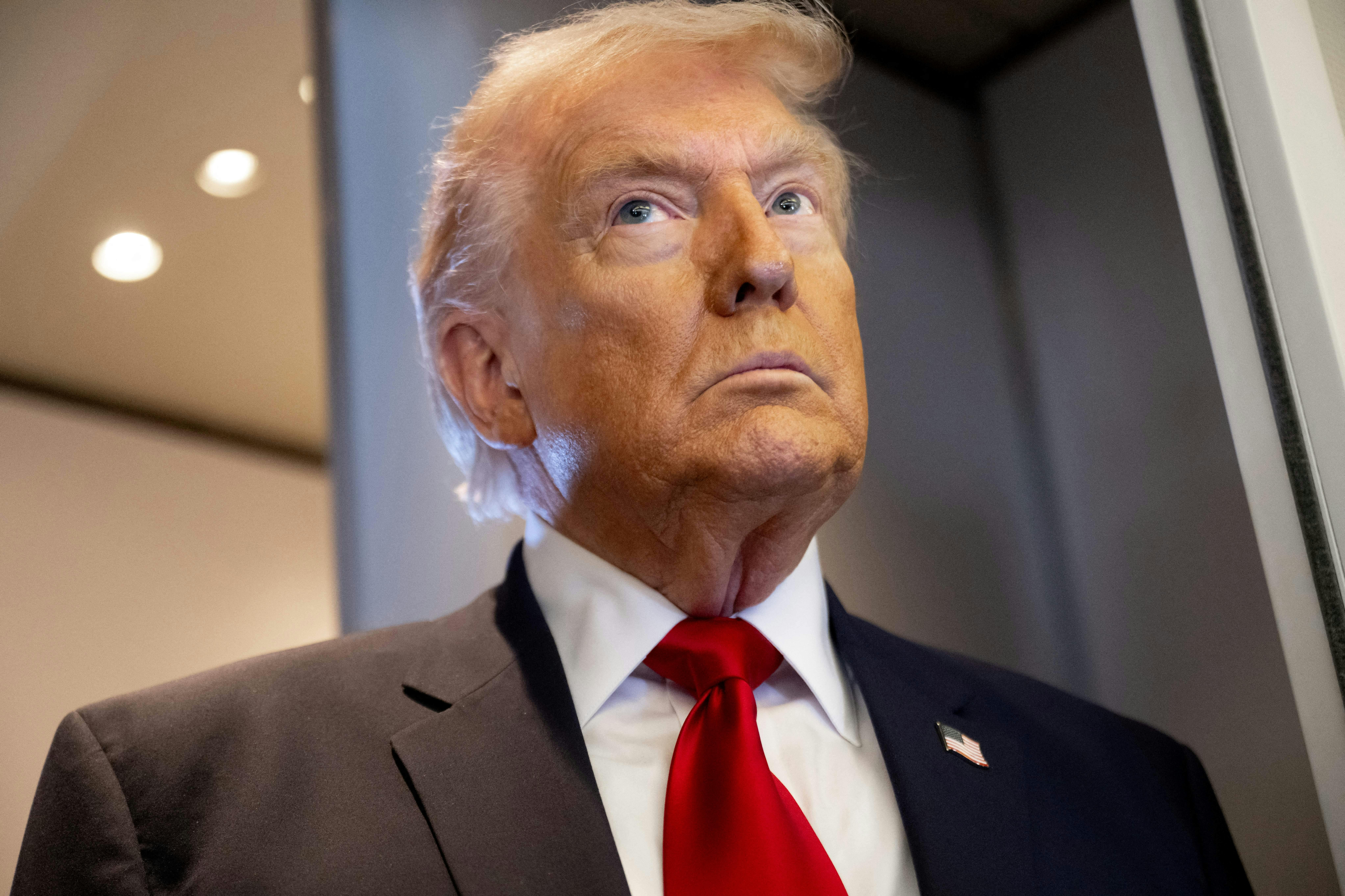 Donald Trump looks up and to his right