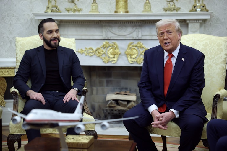 Donald Trump speaks while sitting next to El Salvador's President Nayib Bukele in the Oval Office