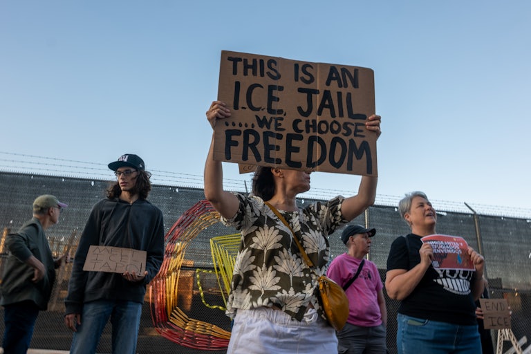 People protest outside an ICE detention center in Brooklyn