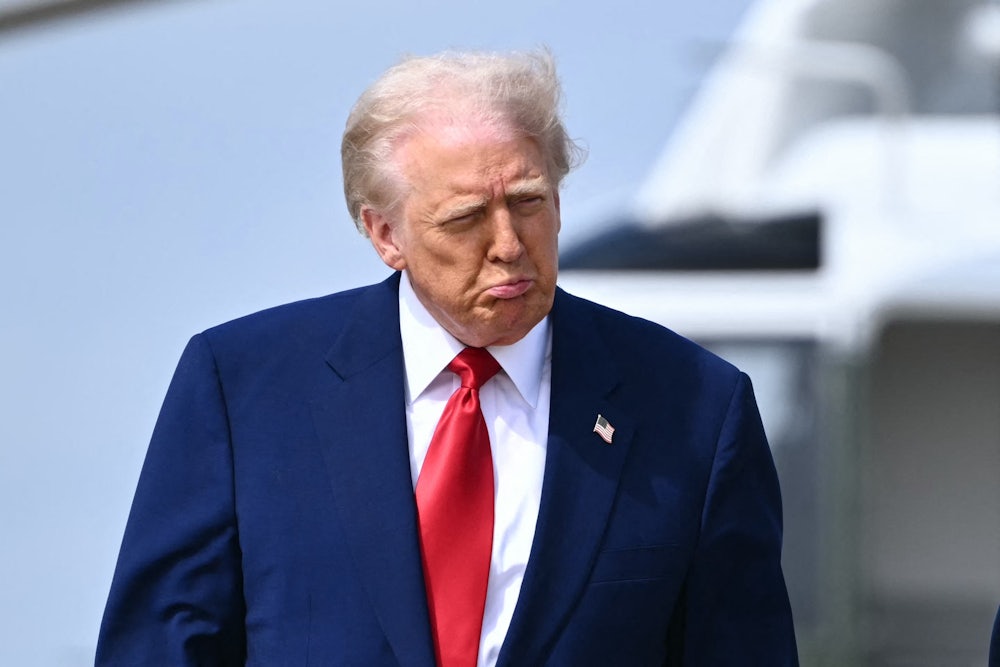 Donald Trump walks to board Air Force One at Joint Base Andrews in Maryland on April 3, 2025.