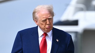Donald Trump walks to board Air Force One at Joint Base Andrews in Maryland on April 3, 2025.
