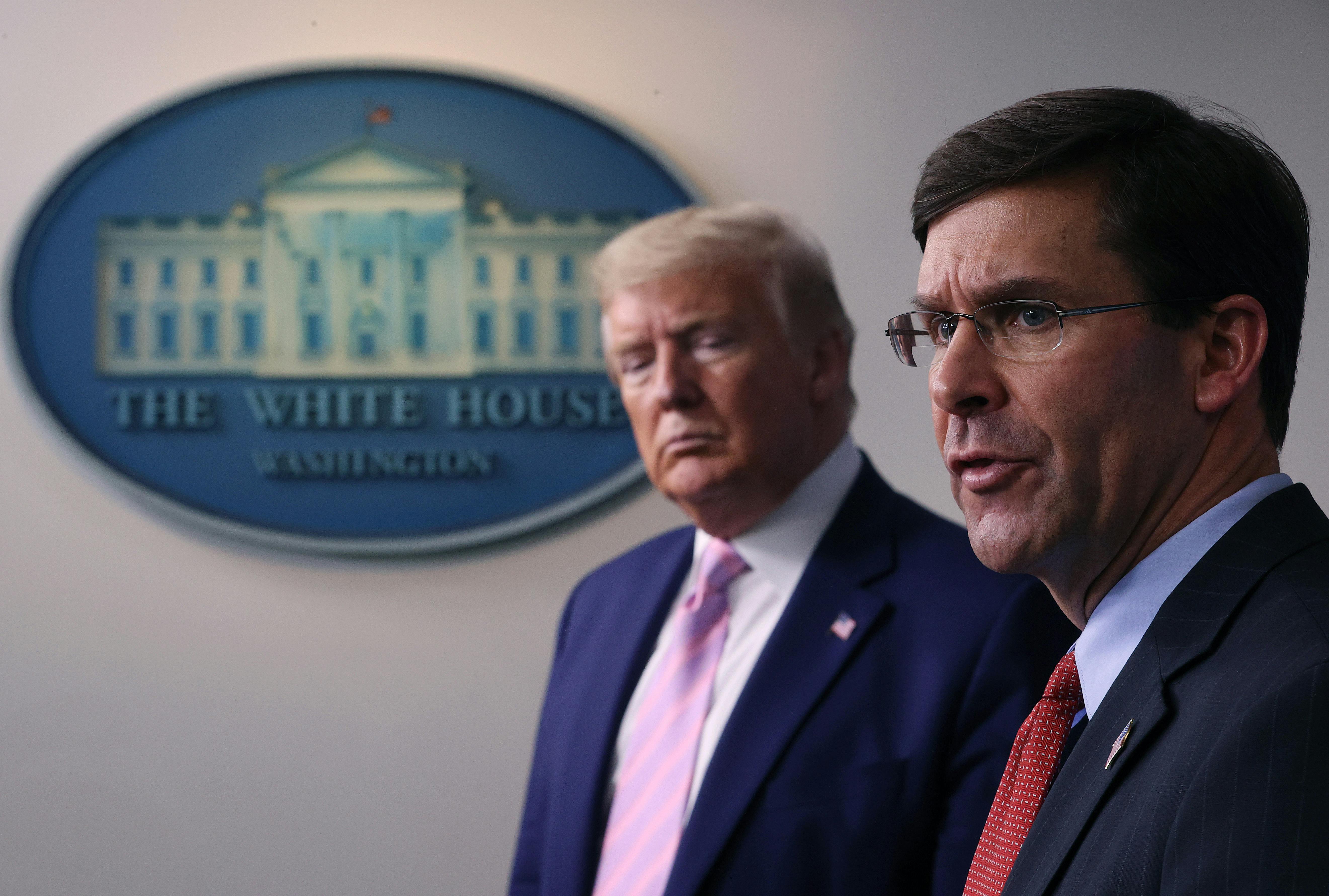 Secretary of Defense Mark Esper and Trump at a press briefing