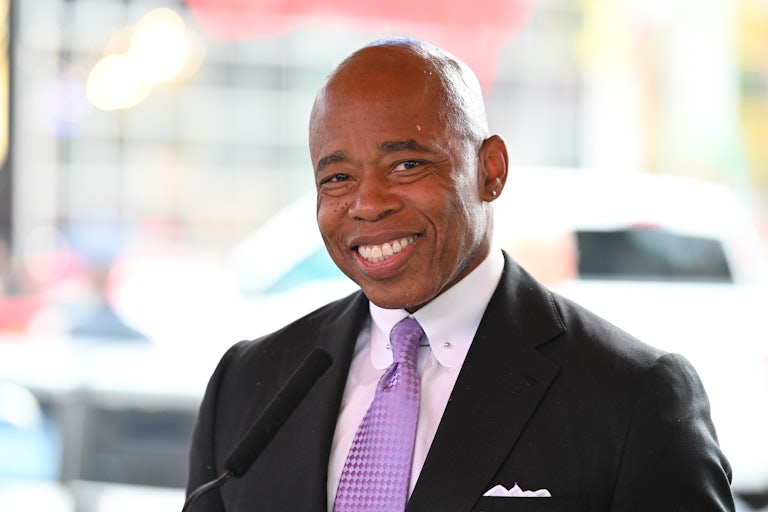 Eric Adams smiles