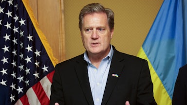 Representative Mike Turner gestures while speaking