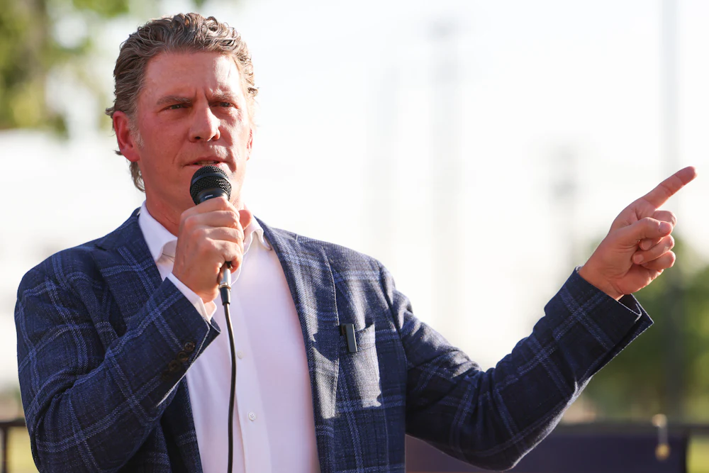 Bo French gestures while speaking at an April 2025 rally Mansfield, Texas.