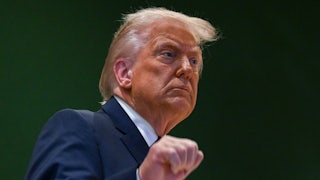 Donald Trump makes a fist