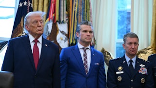 Doanld Trump, Pete Hegseth, and Joint Chiefs of Staff Gen. Dan Caine stand side by side in the Oval Office of the White House.