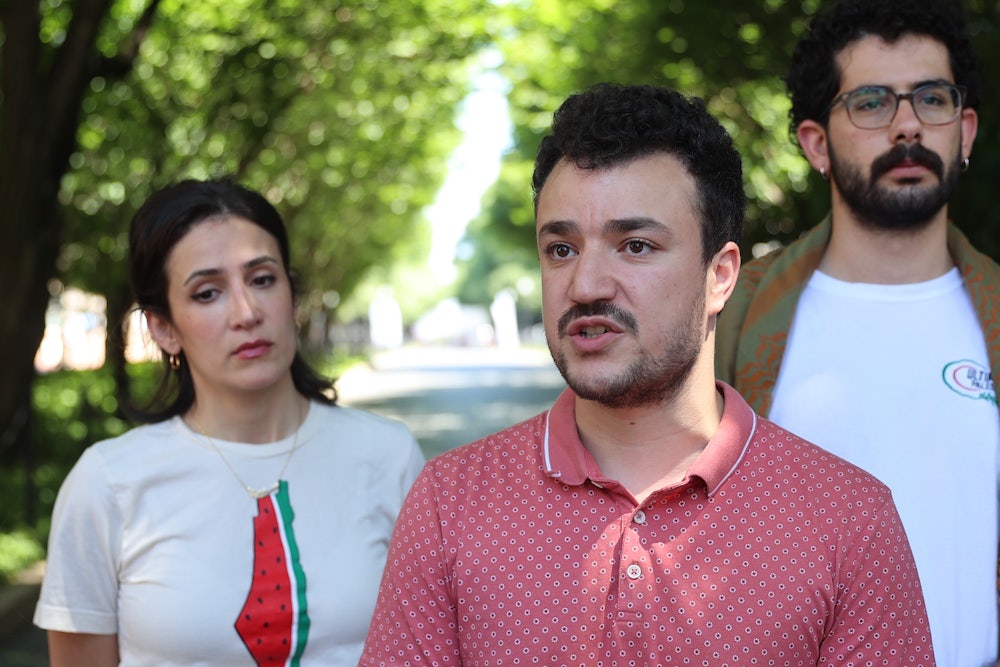 Columbia University student Mahmoud Khalil talks to the press
