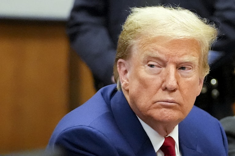 Donald Trump looks to the side