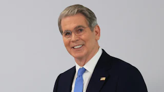 Treasury Secretary Scott Bessent smiles creepily