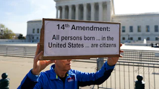 A demonstrator outside the U.S. Supreme Court on April 1, in Washington, D.C.