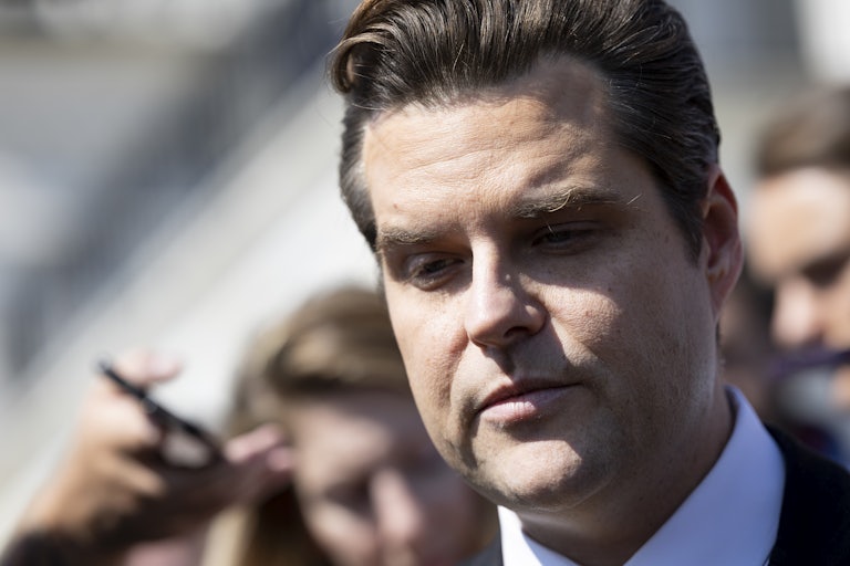 Matt Gaetz looks down