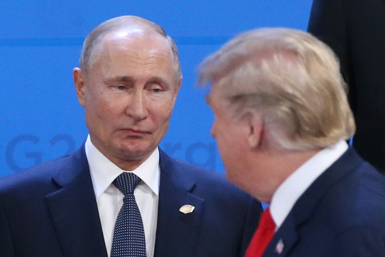 Putin makes a weird face at Donald Trump (face not shown)