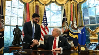 Donald Trump and Zohran Mamdani shake hands in the Oval Office.