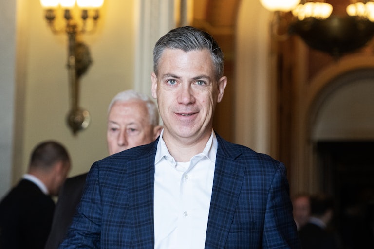 Representative Jim Banks smiles