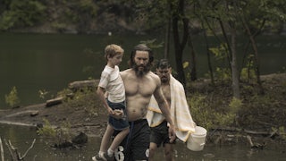Tom Pelphrey, Ben Doherty and Raúl Castillo wade across a river in “Task”