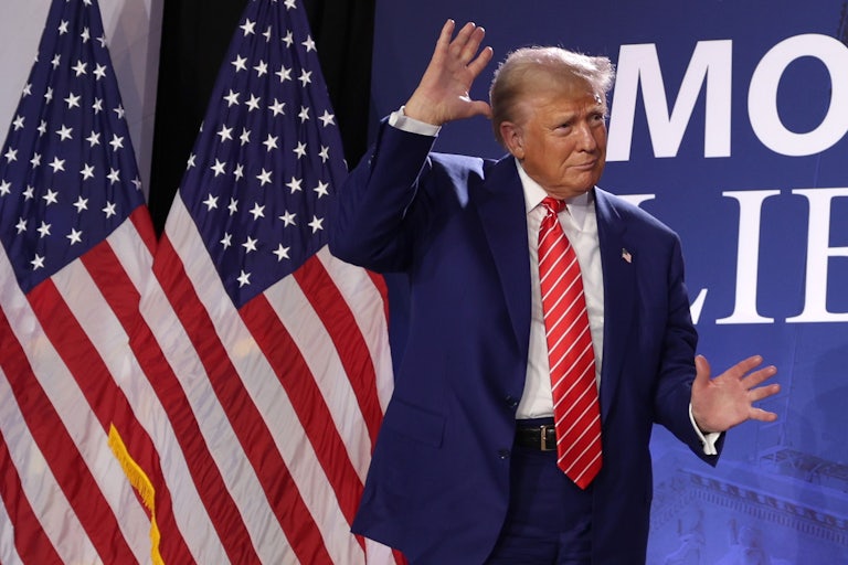 Donald Trump dances onstage at a Moms for Liberty event