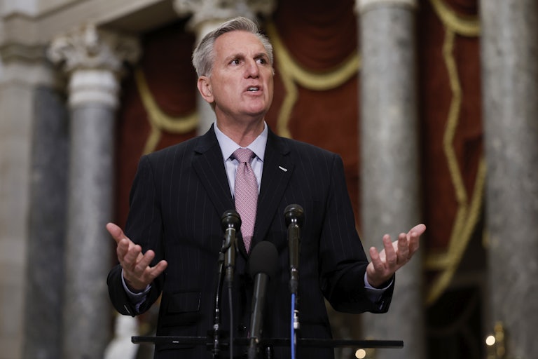 House Speaker Kevin McCarthy speaks at a podium