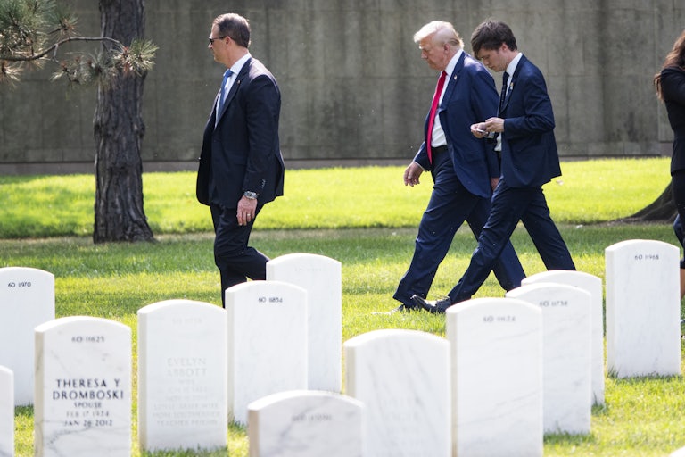Donald Trump walks in Section 60 at Arlington National Cemetery