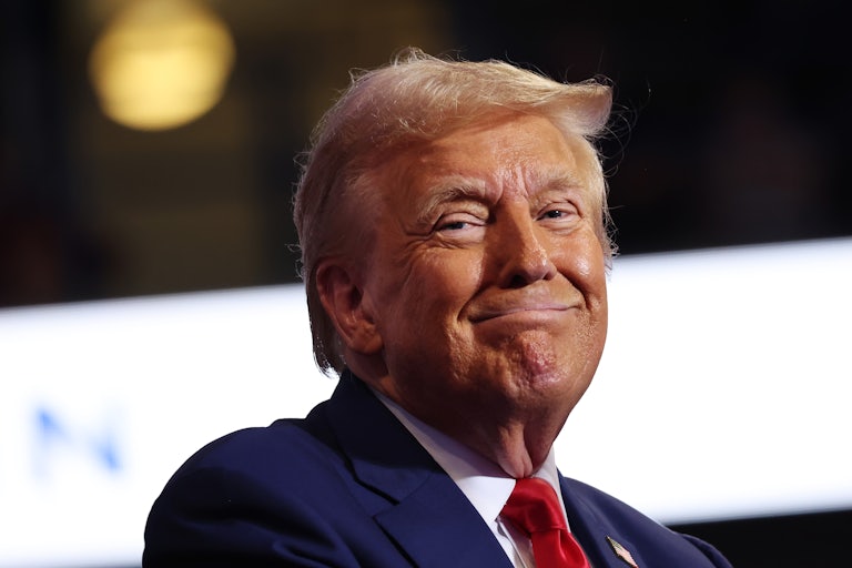 Donald Trump smiles during a campaign rally